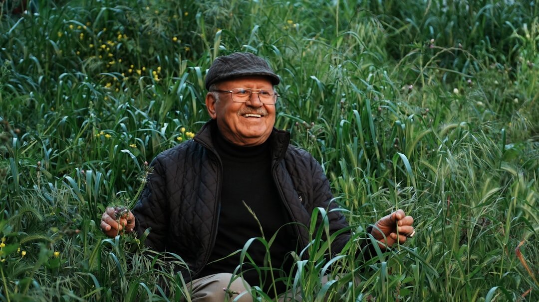 Portrait of a smiling senior Croatian man with glasses