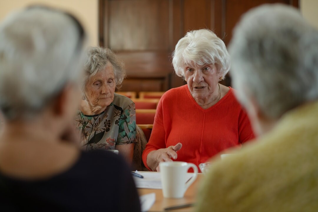 elderly group playing cards
