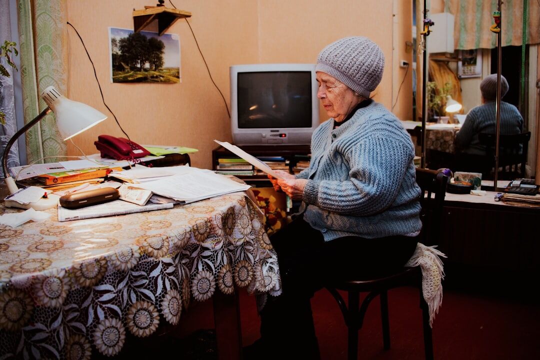 senior woman writing book